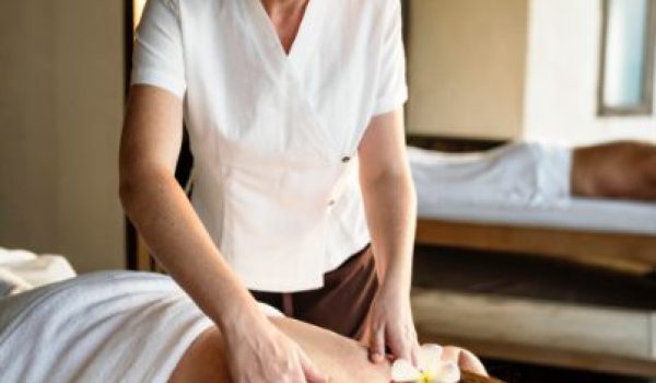 female-message-therapist-giving-a-massage-at-a-spa-W-1.jpg